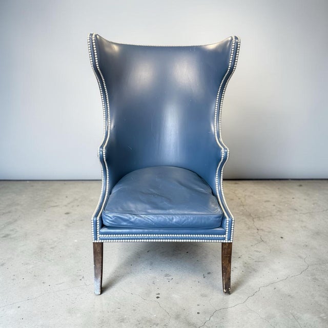 This dramatic and striking wingback chair comes to us from the luxury furniture makers Dennis & Leen. The Highback Wing...