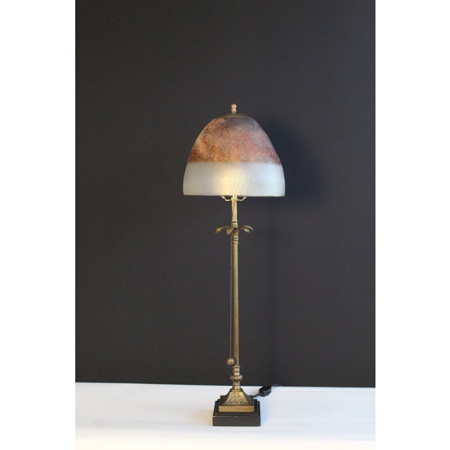 Italian Empire stile. Simple yet ornate . Antique brass finish Sculptural elements consisting of reeded tubing, floret,...