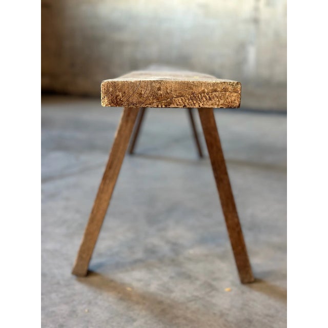 A primitive plank wood bench made of solid oak. The wood has a fabulous silver grey patina and is richly grained. A great...