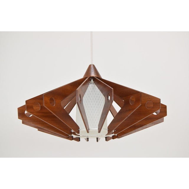 Made of glass, wood New Cabling 1xE27 or E26bulb US wiring compatible The height of the pendant can be shortened Original...