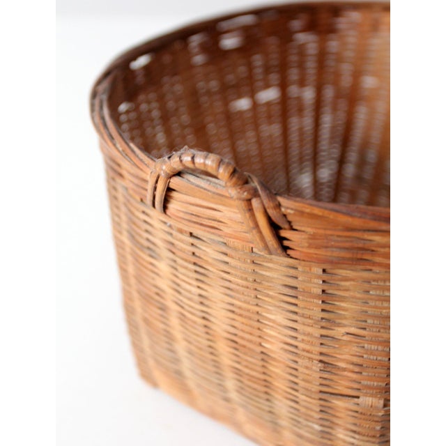 Vintage Woven Rattan Basket With Handles For Sale - Image 11 of 13