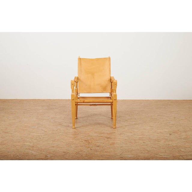 Colonial Chair in Beechwood Frame and Leather by Wilhelm Kienzle, 1928, in Good conditions. Designed 1920 to 1949 I have...