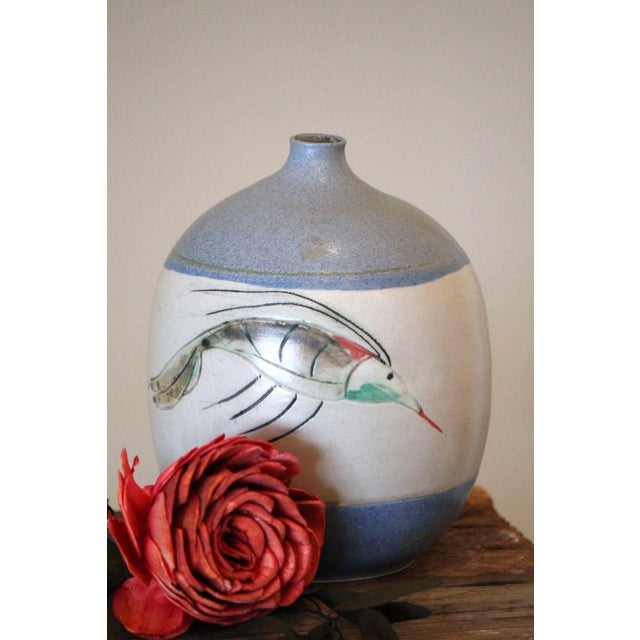 This unique and fun studio pottery vase is signed and numbered by the artist. It features an unusual subject matter of a...