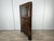1930s Art Decò corner cabinet of Italian production with double silk-screened sliding glass and internal shelves in...