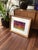 An original oilstick landscape by contemporary American artist Susan R. Wilson, whose expressive paintings of rural and...
