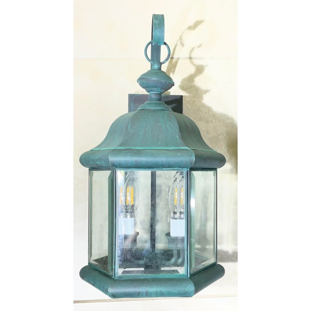 Upgrade your home's curb appeal with this practical pair of heavy-duty solid brass wall-mounted lanterns. Featuring an...