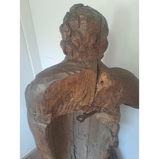 An impressive and monumental carved oak figure of a bearded saint or apostle, dating from the late 16th or 17th century....