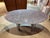 A stunning, extendable granite dining table by Draenert. The granite is most likely Labrador Silver. Depending on the...