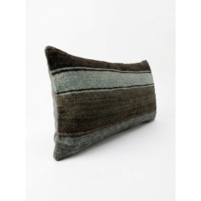 This beautiful 17'' x 39'' hand-woven Kilim pillow cover was made from an authentic Turkish kilim. The traditional flat-...