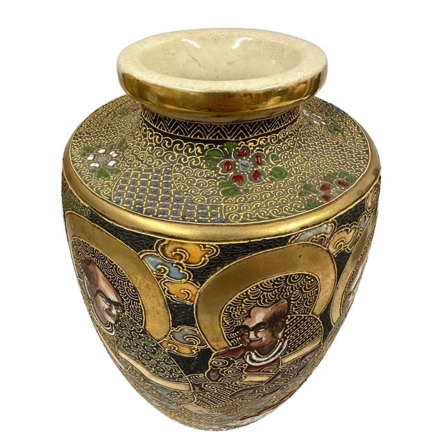 This item is a Japanese Export Satsuma earthenware vase, heavily decorated with gilt and raised enamel detailing (moriage...