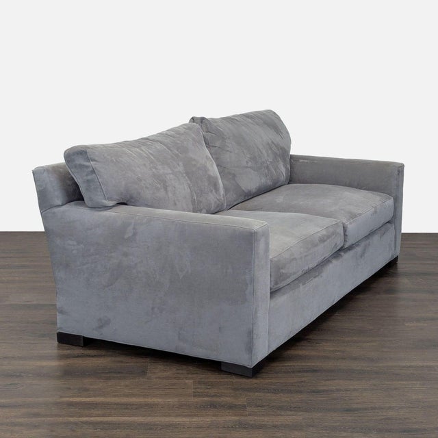 This Crate and Barrel 3-seat sofa offers modern comfort and style with its clean lines and soft gray fabric. Generously...