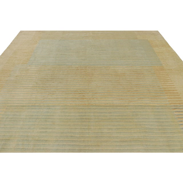 Made with hand-knotted wool, this 10x14 contemporary Art Deco rug is a particularly unique addition to Rug & Kilim’s...
