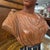 Splendid antique terracotta sculpture with a 19th-century patina and a painted wooden base. Excellent. Dimensions: H 52...