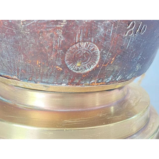 This a Ceramic Table Lamp. It has been done in France circa 1900. The color is green and brown. It is signed Georges...