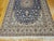 5’ 7” x 9' A beautiful Persian Nain room-size rug in a very rare French blue color and cream colors with silk highlights...