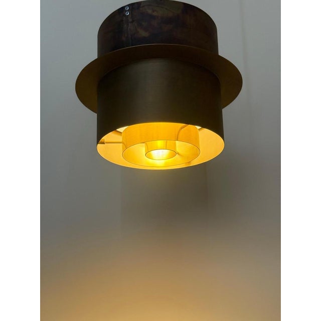 An exceptional german mid-century architectural ceiling light, circa 1960, originating directly from the hauptkirche...