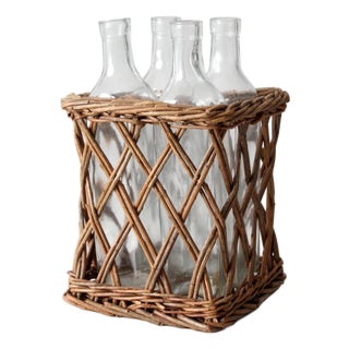 Vintage Wicker Bottle Basket With Glass Bottles For Sale