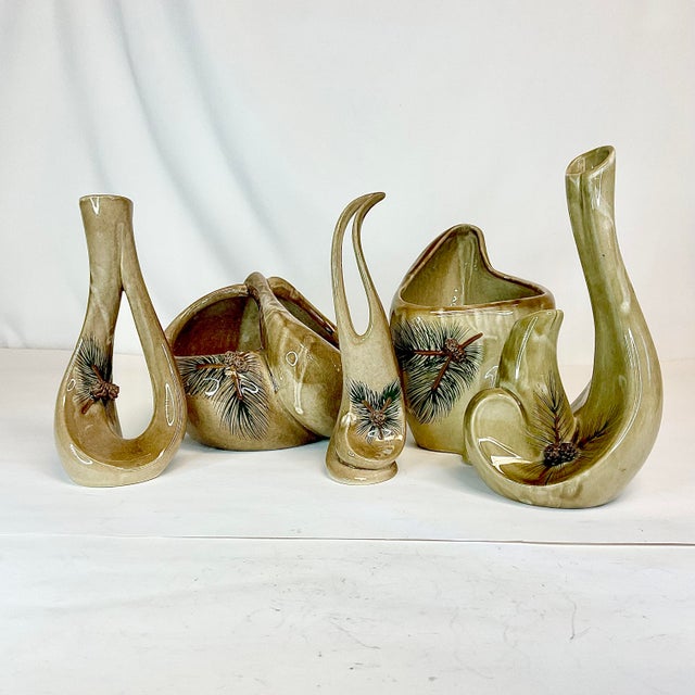 This collection of 5 pieces of studio pottery includes 3 unique vases and two centerpiece containers or Planters. Each are...