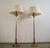 Pair of 1970's Hollywood Regency torchiere floor lamp for sale. They were manufactured by Stiffel, and are high-end brass...