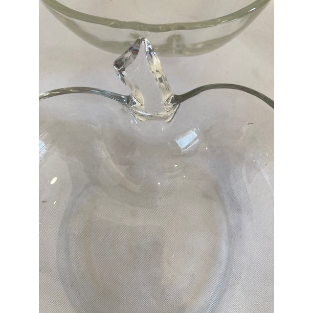 This charming set of six vintage Anchor Hocking apple-shaped bowls showcases classic mid-century American glassmaking....