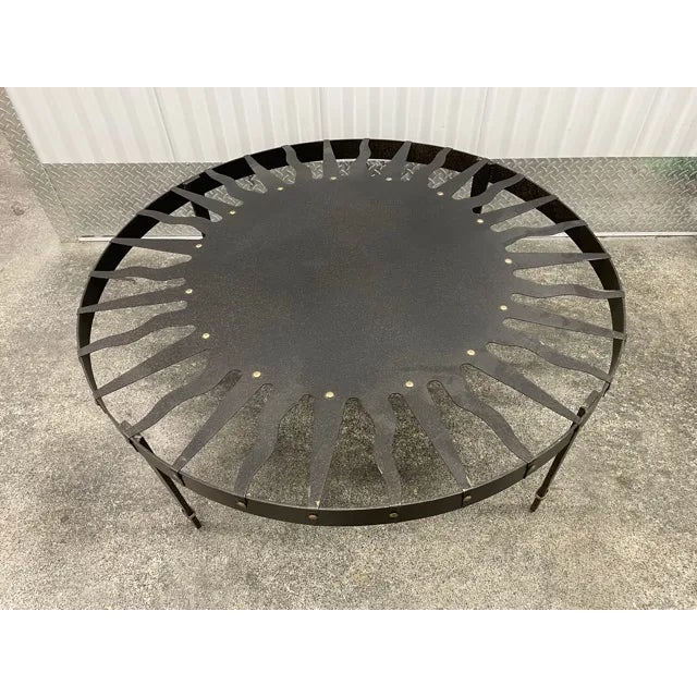 Whimsical Vintage Iron Le Soliel Coffee Table With Brass Studs sold as found in vintage condition with one small flea bite...