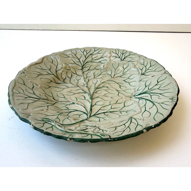 Featuring a crisp white glazed surface with hand-painted green veining, this highly sought-after design is an elegant...