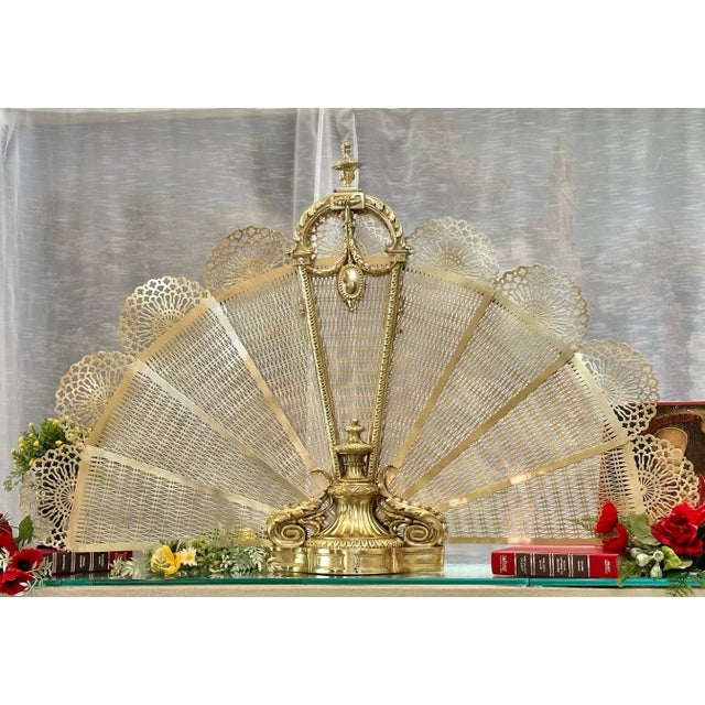 This is for a wonderful Large RARE Antique Solid English brass "peacock fan" fireplace screen. This exceptional piece...