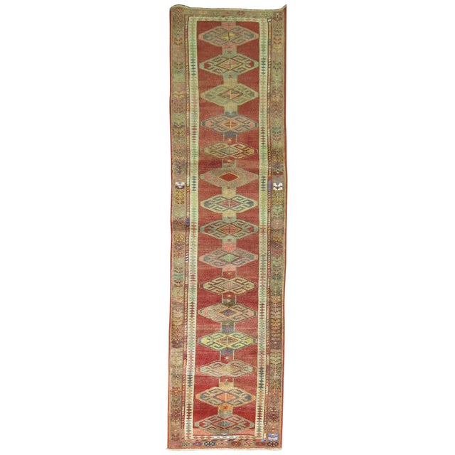 A colorful one-of-a-kind Armenian Runner from the 20th century. 2'11'' x 11'1''