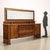 Buffet with shelf and mirror, hinged doors and drawers under the top. In briar and walnut veneer. This piece is attributed...