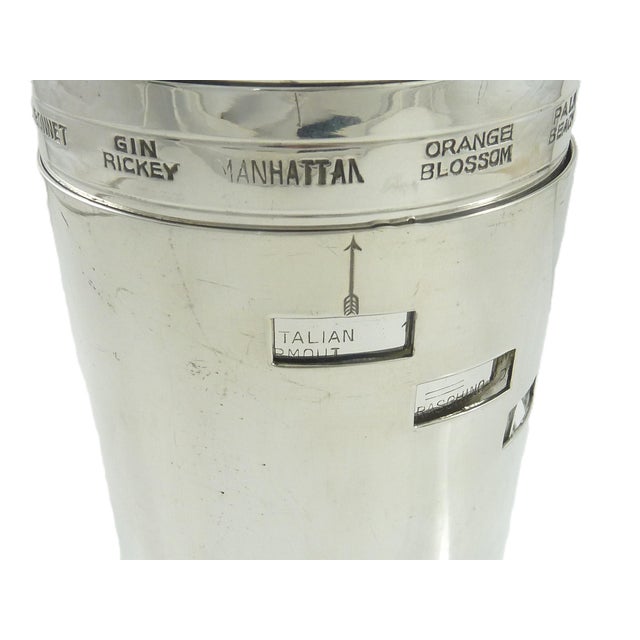 An Italian “dial-a-drink” cocktail shaker by Giuliano Bossi crafted in silver plate circa 1930. Cleverly designed, the...