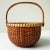 This beautifully handcrafted vintage Nantucket Lightship Basket is a signed piece, marked by the artisan on the underside....