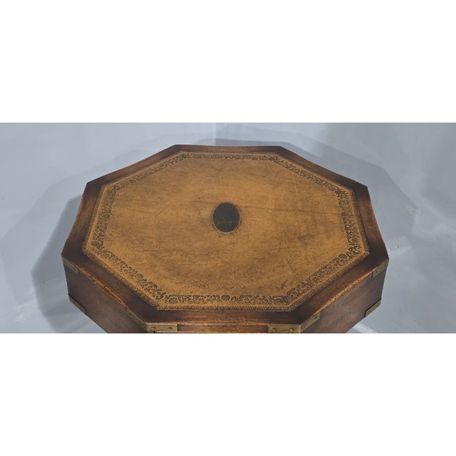 A fine quality mahogany four oak lined drawer campaign drum table, inset brass banding and handles, brass castors, leather...