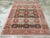An antique Persian Senneh accent rug. The decisively abrashed slate field of this Kurdish town scatter from western Persia...