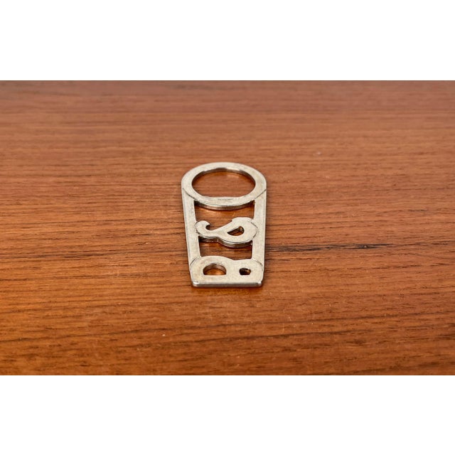 Vintage Danish Metal Bottle Opener from Bang & Olufsen, 1970s, in Very Good conditions. Designed 1970 to 1979 This piece...