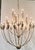 Original retail $4990, stylish Currey & Company Modern Large Silver Paradox Chandelier, showroom floor sample