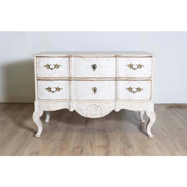 This 18th-century Danish commode, circa 1780, showcases the graceful curves and refined elegance typical of Scandinavian...