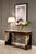 A commanding presence of Empire-era refinement, this handcrafted console table is a striking blend of luxurious materials...