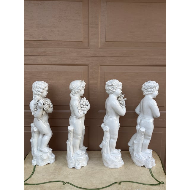 Mid 20th Century Neoclassical Italian White Porcelain Allegorical Cherub or Putti Statues of the Four Seasons, Set of 4 For Sale - Image 18 of 18