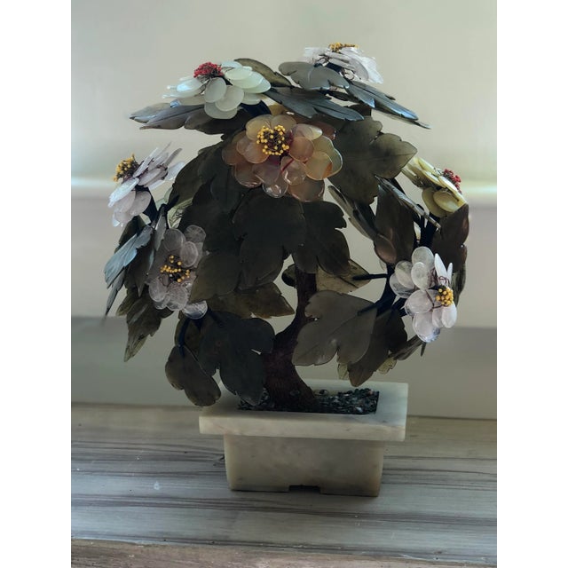 This beautiful little Bonsai tree is in full bloom just in time for Spring. Made of jade, quartz, and other semi-precious...