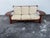 A rare and well-preserved transitional modern American Craftsman style sofa designed by Dutch born craftsman Herman De...