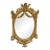 The Gilded Oval – French Baroque Wall Mirror With Exquisite Gold Leaf Carvings For Sale