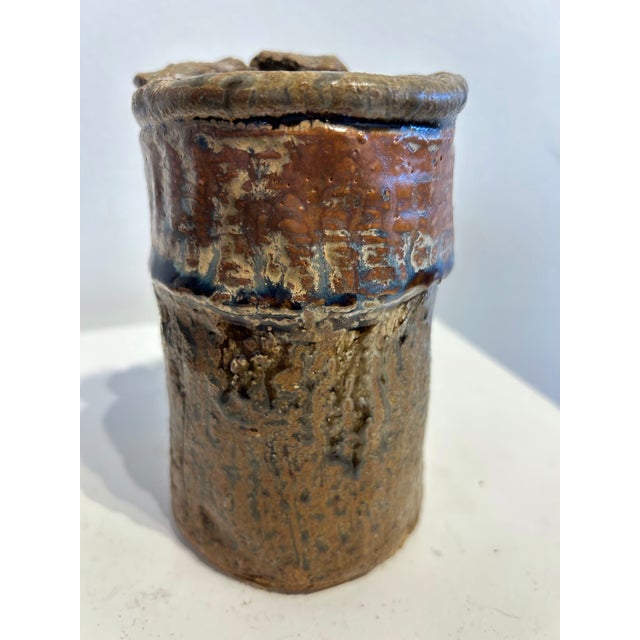 Slab ceramic vase with minimal glaze. Unable to attribute artists name from signature on base. Acquired at Evanston, IL...