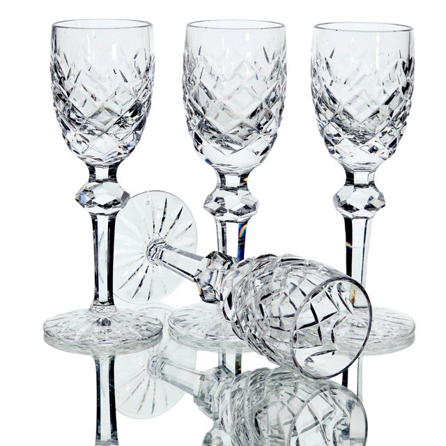 This set of four authentic Waterford Crystal Powerscourt cordial glasses was produced in Ireland during the Late 20th...