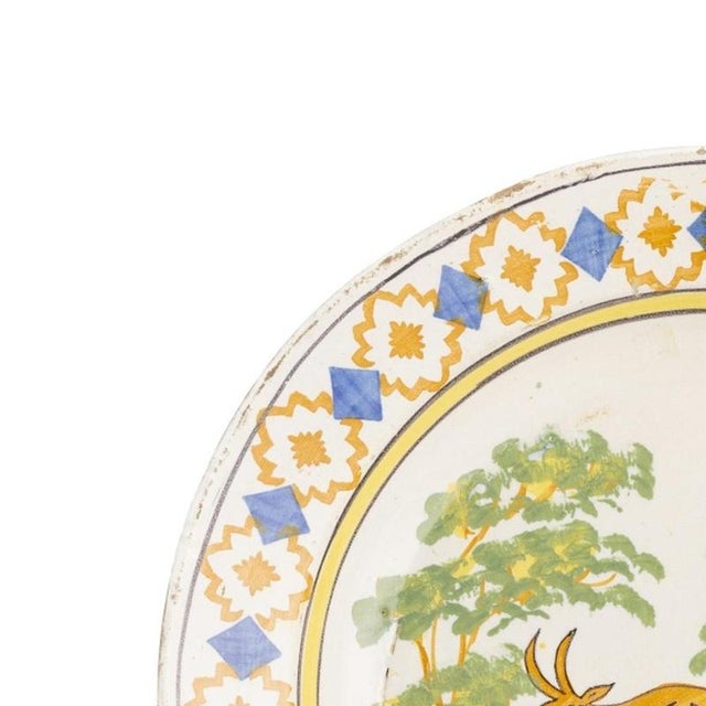 Earthenware - Earthenware plate - 19th century. Portuguese, 19th century, manufactured in the north. Decoration partly...