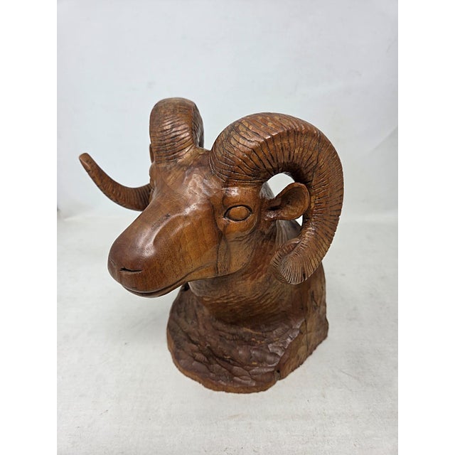 Here is a vintage hand-carved wood Bighorn Sheep ram's head sculpture. Signed on the back: Orren Hutter 11-15-66 Calif....