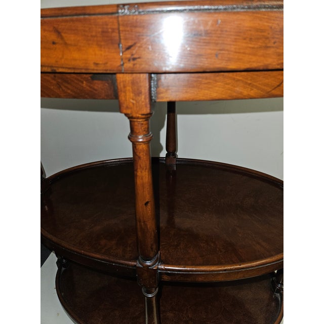 Chic little Burl walnut side table with 3 tiers. Top tier lifts as a tray. Excellent quality as you would expect from...