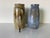 This charming pair of vintage studio art pottery vases by the artist Buk showcases a warm blend of rustic craftsmanship...