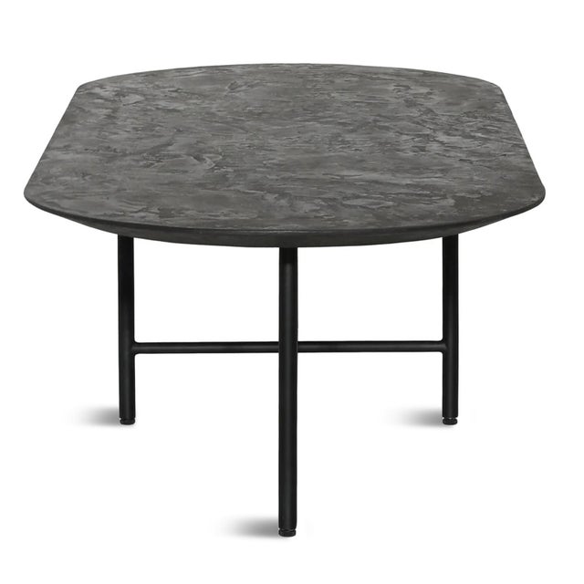 Modern black oval top coffee table with black iron base. Top is micro cement with beautiful textured finish which will...