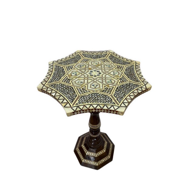 This handmade wooden end table is a true piece of Islamic art, crafted using traditional techniques and inlaid with...