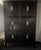 Statement Storage Piece. Handsome reproduction Chinese apothecary style cabinet with ebony stained finish and brass...